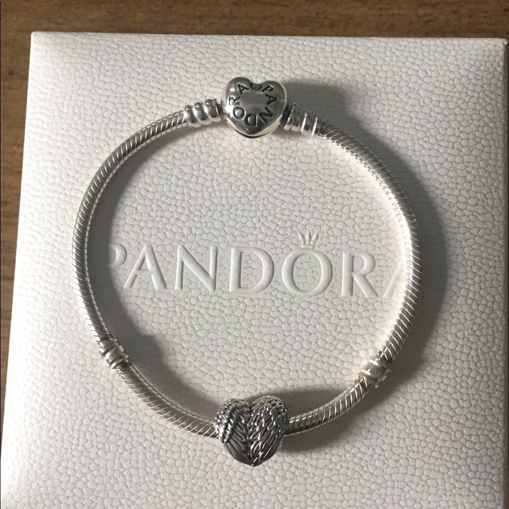 Authentic Pandora bracelet with heart charm